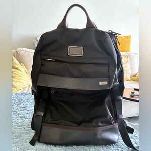 Tumi Black and BrownBackpack in excellent used condition. Great office & travel